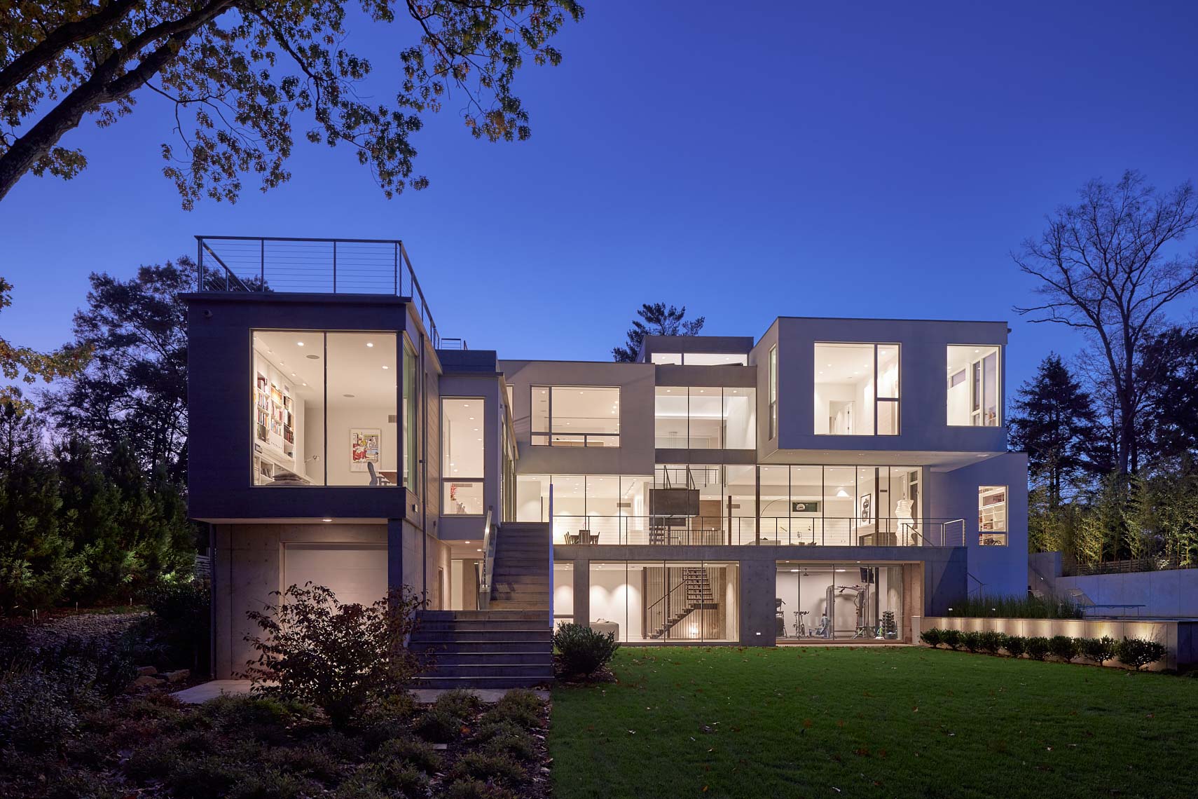 Modern Lake House - Twilight - Rear Elevation
