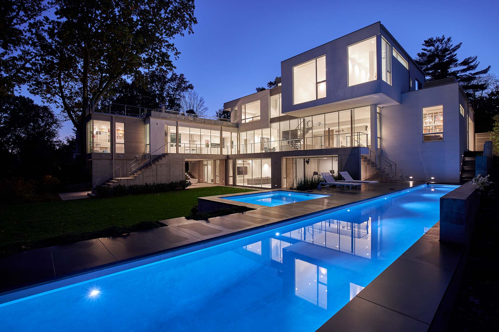 Modern House on Lake Carnegie - Rear Elevation at Twilight with Pool